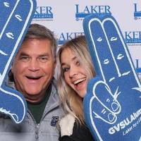 Father and daughter posing together